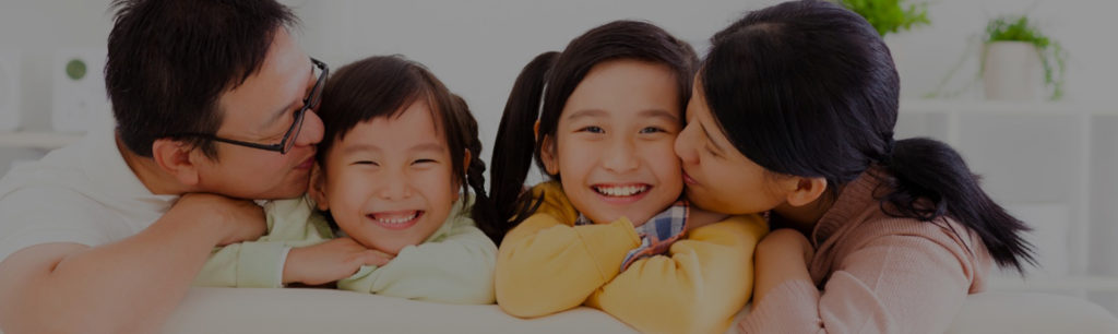 Family reviewing estate planning documents to understand cost basis step up and inheritance tax planning in California