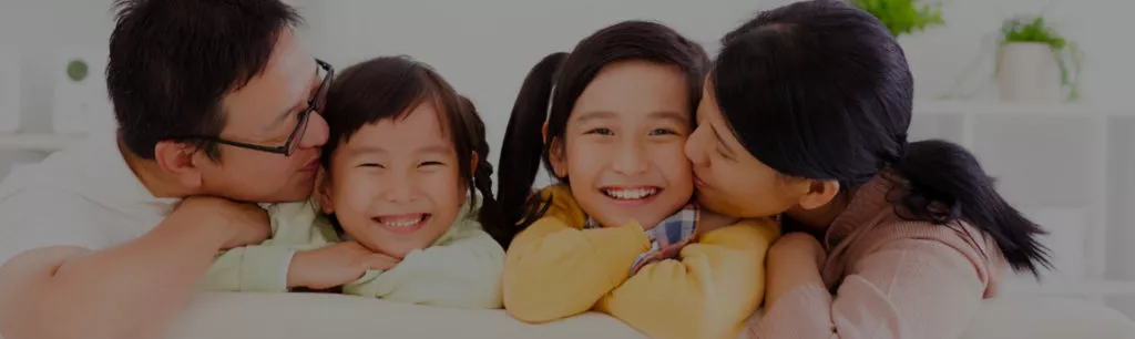 Family reviewing estate planning documents to understand cost basis step up and inheritance tax planning in California